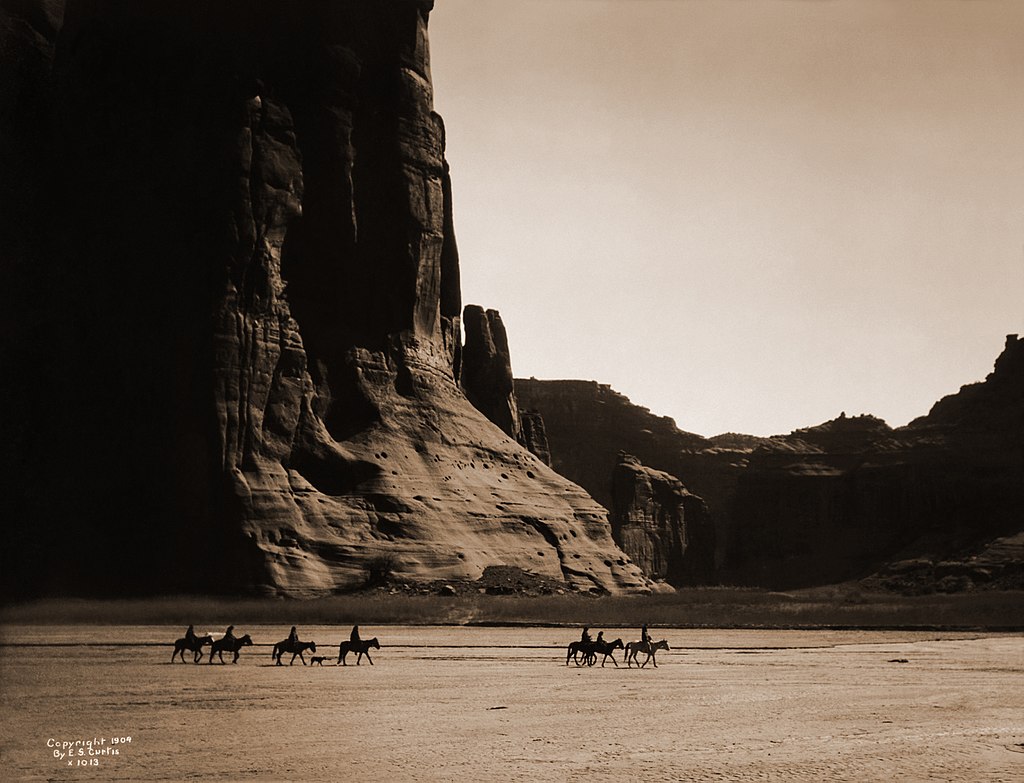 Canyon de Chelly, seven riders and a dog
